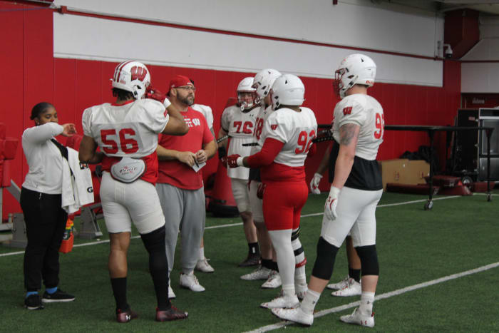 Ross Kolodziej speaking with the defensive line.